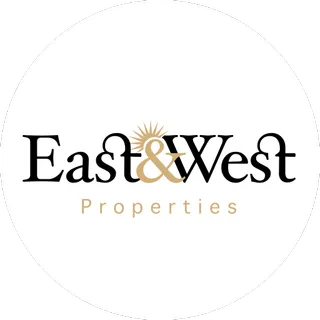 East & West Properties logo